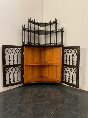 Wrought iron store corner cabinet