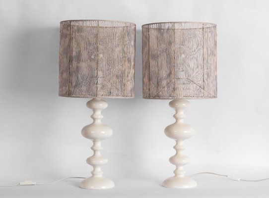 white wooden bedside lamps
