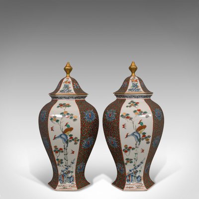 https://cdn20.pamono.com/p/g/5/5/552059_pih5yrqm4a/vintage-ceramic-hexagonal-spice-jars-1950s-set-of-2-2.jpg