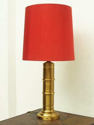 large red table lamp