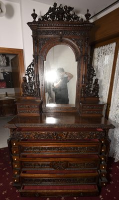 Antique walnut store dresser with mirror