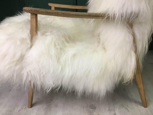 White fluffy armchair top