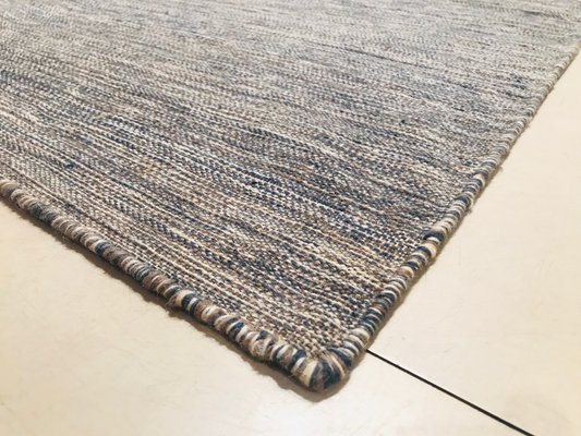 Alfombra Kilim india de lana beige y azul y algodón, años 70 Alfombra Kilim india de lana beige y azul y algodón, años 70
