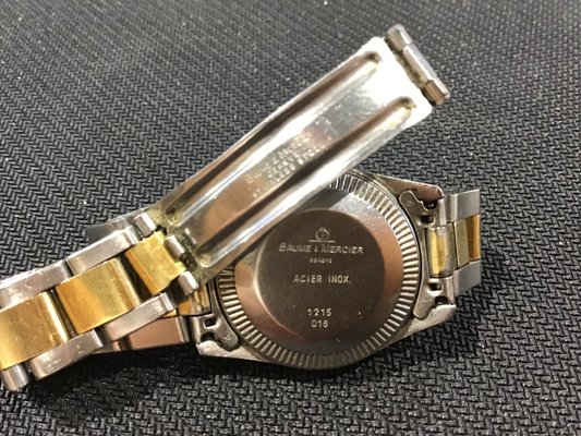 Horloge en Acier et en Or de Baume Mercier ann es 70 en vente