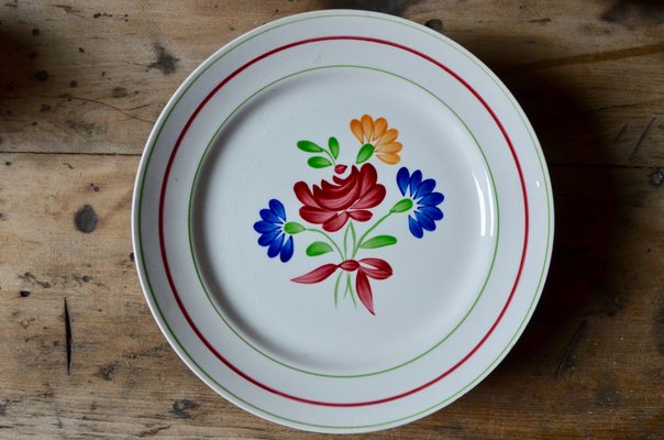 Superbe service de table en faïence à décor floral, fin XIX ème, 74