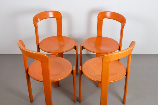 German Model 33 Stackable Orange Dining Chairs By Bruno Rey For