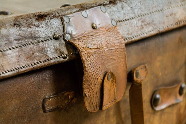 vintage leather suitcase with straps