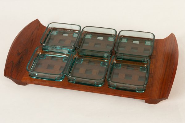 https://cdn20.pamono.com/p/g/5/7/571745_x71zzjukgx/vintage-danish-teak-and-glass-tray-by-jens-quistgaard-for-ihq-dansk-designs-1960s-4.jpg