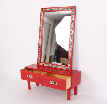 Red dresser with mirror top