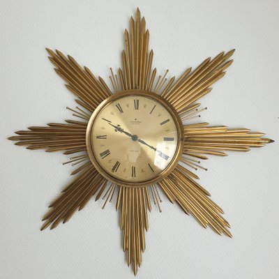 Large Mid Century Brass Sunburst Wall Clock From Junghans 1960s - Vintage Mid Century Starburst Wall Clock Large Mid Century Brass Sunburst Wall Clock From Junghans 1960s - Vintage Mid Century Starburst Wall Clock