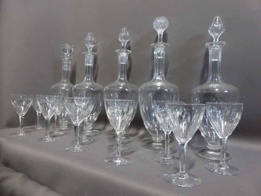 https://cdn20.pamono.com/p/g/6/0/605440_ir45rtxs1p/antique-crystal-glasses-decanters-set-of-56-1.jpg
