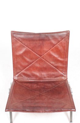 Mid Century Patinated Leather Model, French Connection Leather Chair