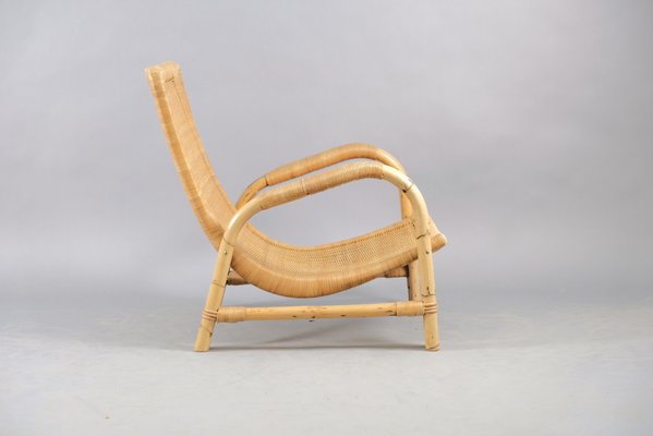 Vintage rattan lounge chair deals
