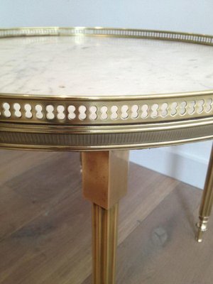 Small round table with outlet marble top