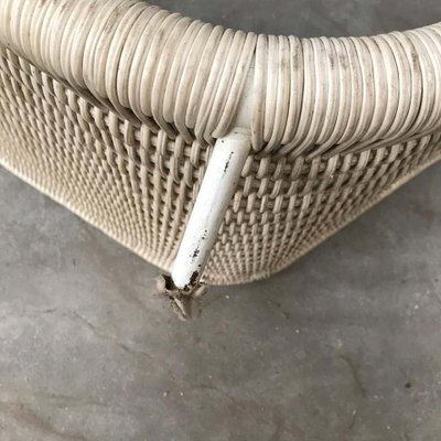 Plastic wicker store chaise lounge