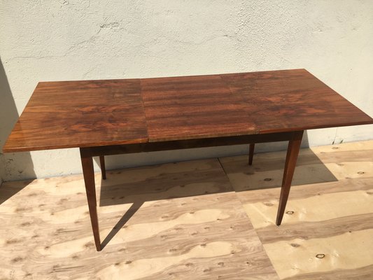 Flip out dining outlet table