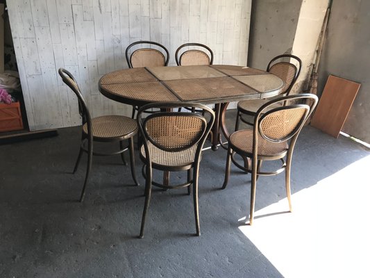 Cane chair and table set deals