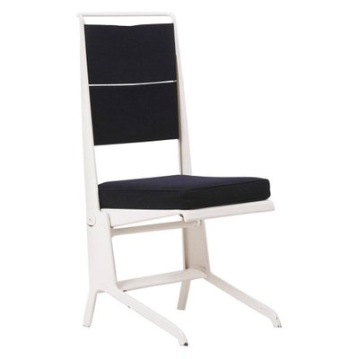 white metal folding chairs