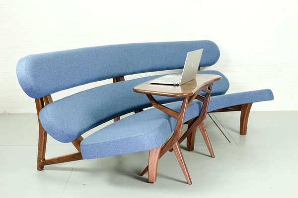 Floating curved sofa discount