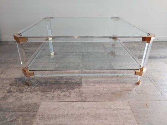 Acrylic and sale brass coffee table