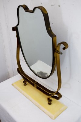 hinged mirror