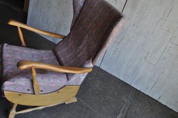 Brown wooden 2024 rocking chair