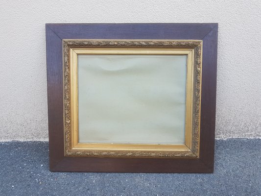 https://cdn20.pamono.com/p/g/7/0/706613_7bicsrxbaw/large-vintage-gilded-wooden-frame-1920s-1.jpg