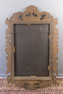 Vieux miroir en bois sculpté à la main sur