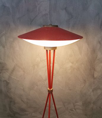 red tripod floor lamp