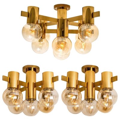 Set of Five Doria Brass Light Fixtures, 4 Wall Lights and 1 Chandelier, 1960 Set of Five Doria Brass Light Fixtures, 4 Wall Lights and 1 Chandelier, 1960