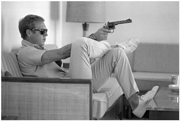 Steve Mcqueen Takes Aim Framed in White by John Dominis for sale