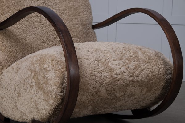 Swedish Sheepskin Rocking Chair 1950s for sale at Pamono