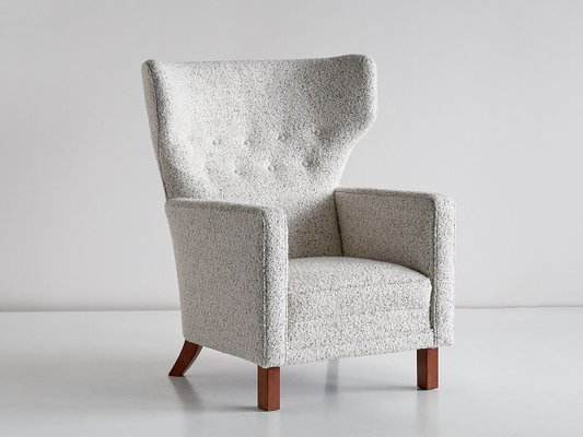 Finnish Pearl Boucl Fabric and Beech Wingback Armchair by Paul Boman for Boman OY 1940s