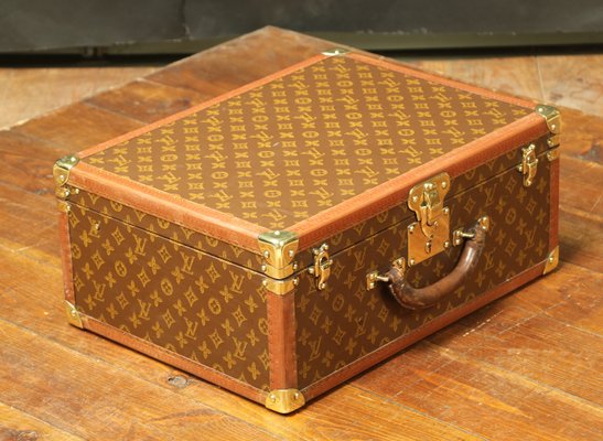 louis vuitton luggage with wheels