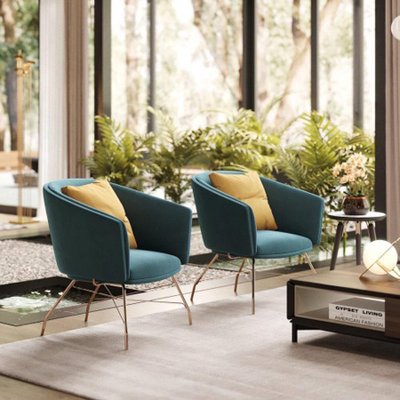 Metal outlet leg armchair