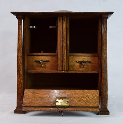 A beautiful burr walnut smokers cabinet circa 1880. antique arts crafts smokers cabinet