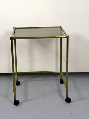 Vintage Brass Side Table On Wheels With Smoked Glass Top For Sale At Pamono About 3% of these are office desks, 5% are coffee tables, and 1% are dining a wide variety of tables with wheels options are available to you, such as specific use. vintage brass side table on wheels with smoked glass top
