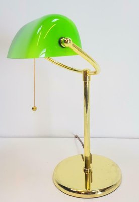 green and brass desk lamp