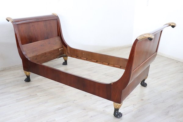 Vintage wooden store sleigh bed