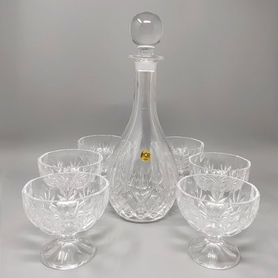 https://cdn20.pamono.com/p/g/7/9/796287_9v0jot10iq/vintage-italian-mid-century-crystal-decanter-with-6-crystal-glasses-1960s-set-of-7-1.jpg