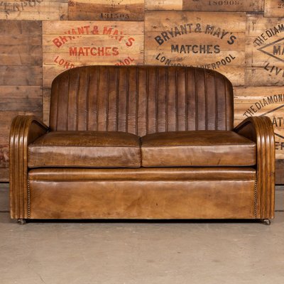 Art deco sales leather sofa