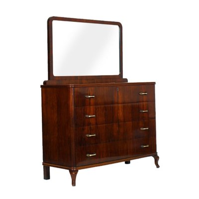 A rich cherry wood finish blends beautifully with both light and dark colors, and six drawers provide a generous amount of storage space. art deco walnut mirrored dresser 1930s set of 2
