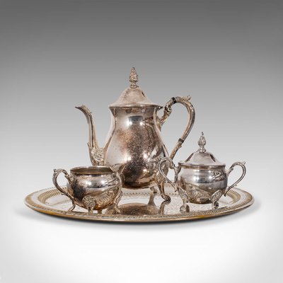 https://cdn20.pamono.com/p/g/8/3/830395_dx3m71ftkh/antique-silver-plated-tea-service-set-of-4-1.jpg