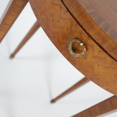 Mersman side outlet table with drawer