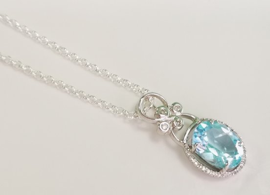 White Topaz and Blue Diamond Pendant 