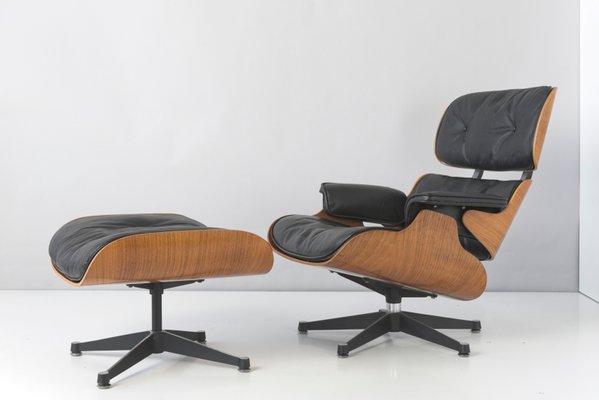 Rosewood Lounge Chair & Ottoman by Charles & Ray Eames for Contura, 1950s,  Set of 2 for sale at Pamono