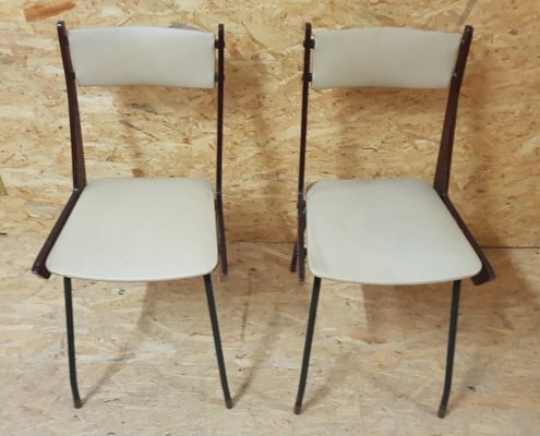 Sedie da pranzo Boomerang moderne in ferro e legno, Italia, anni '60, set  di 2 in vendita su Pamono