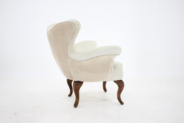 curved armchair