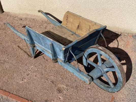 Rustic wheelbarrow for sale deals