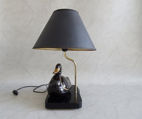 Lámpara de mesa en forma pato de cerámica negra y dorada, años 70 en venta en Pamono